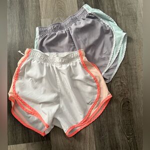 Two Nike Women’s White & Gray Athletic Shorts with Neon Coral and Mint Trim